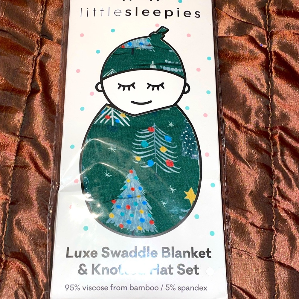 Little sleepies Christmas swaddle.   40x40 are the measurements.